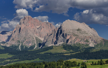 South-east view of Sassolungo  & Sassopiatto mountains, located between Gardena & Fassa valleys, seen from Alpe di Siusi/Seiser Alm, Dolomites, Trentino, Alto Adige, South Tirol, Italy. 