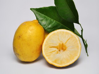 Yellow lemon fruit isolated on white background