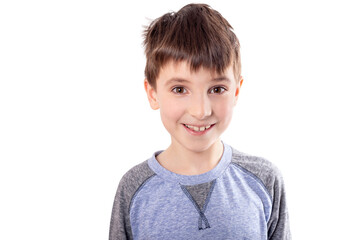 Portrait of a cheerful adorable young  boy looking at camera.