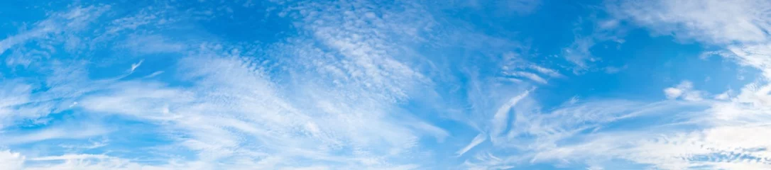 Panorama of a blue sky with white clouds as a backround © Günter Albers
