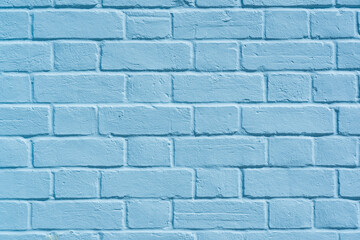 Close up of pastel blue painted brick wall background texture. Aldeburgh, Suffolk. UK
