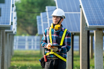 Electrician checking solar panels,Green energy,Solar power plant to innovation of green energy for life.