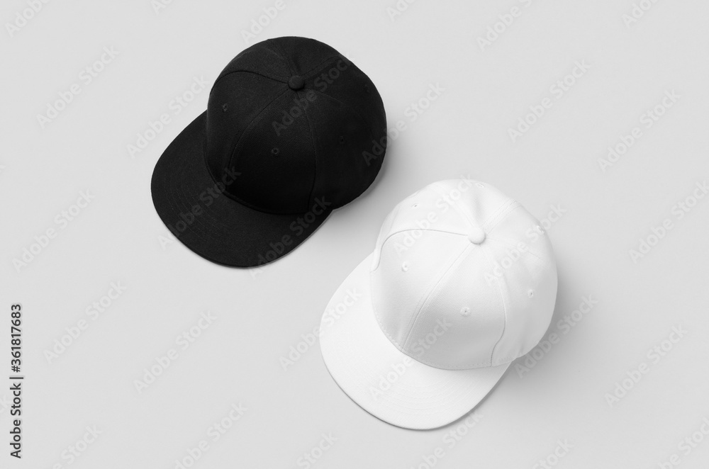 Poster white and black snapback caps mockup, side by side.