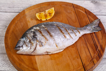 Grilled dorada with lemon