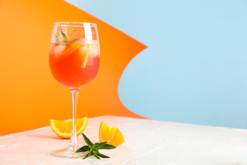 Composition with aperol spritz cocktail on color background. Summer drink