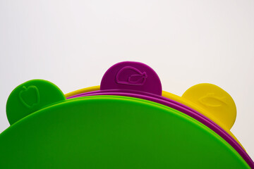 multi-colored boards of different colors: green, purple and yellow, isolated on a white background