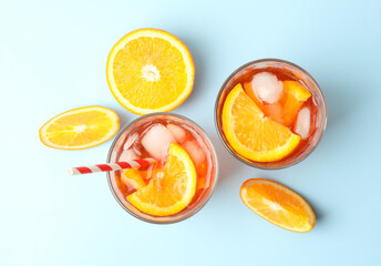 Aperol spritz cocktail on blue background. Summer cocktail