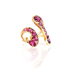 Golden red gemstone ring isolated on white background