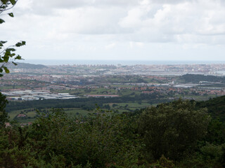 Panoramic view of the countryside with villages in the distance