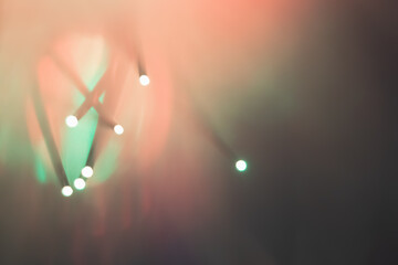 Abstract background. Fantastic fancy plants with colored branches with luminous dots at the ends....
