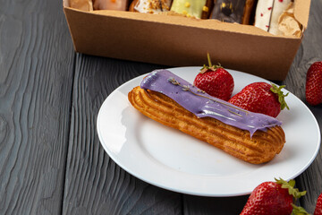 Close up photo of fresh french eclair cake with icing