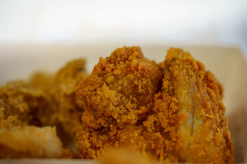 Close-up of delicious fried chicken and soft focus background