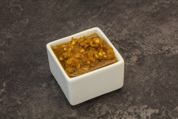 Green spicy sauce in the bowl