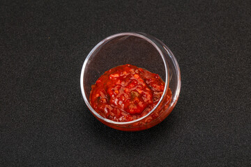 Tomato spicy sauce in the bowl