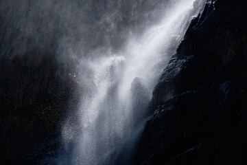 water falling at high speed in a ray of light