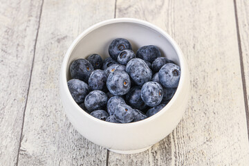 Obraz na płótnie Canvas Sweet fresh juicy blueberries heap