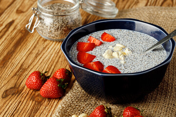 Bowl of chia pudding with fresh strawberries