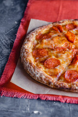 Pepperoni pizza closeup with selective focus