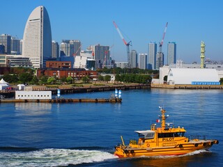 yellow pilot boat in Yokohama harbor