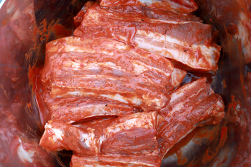 Marinated pork ribs in bowl