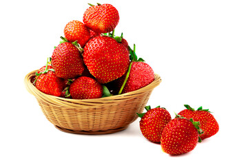 Strawberry. Close-up of sweet ripe strawberries in a basket isolated on a white background.