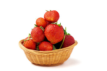 Strawberry. Sweet juicy strawberries in a basket isolated on a white background close-up.