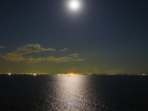 moonlight reflection on gulf of Tokyo,view of Chiba from Umihotaru rest area on the sea