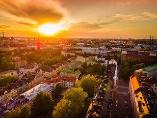 Aerial sunset view of beautiful city Helsinki . Colorful sky and colorful buildings. Helsinki,...