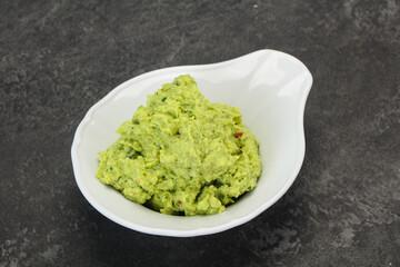 Avocado guacamole sauce with chili pepper