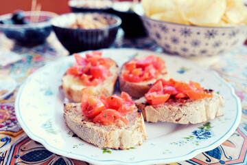 aperitif with bread, chips and drink