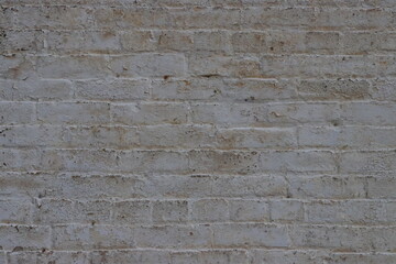 Old decrepit and weathered wall in disrepair.