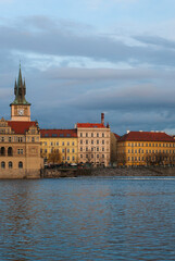 Fototapeta premium Panorama of the city of Prague, Czech Republic on a sunny day. View of the bank of the Vltava River.