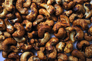 Vegemite roasted cashew nuts straight out of the oven close up shot