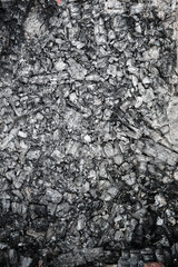 black gray charcoal texture. Monochrome abstract texture of cooling down wooden coal and cinders