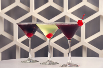 Fruit martini on white table with modern design bar background