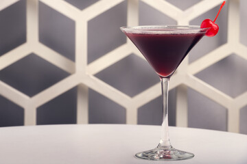 Fruit martini on white table with modern design bar background