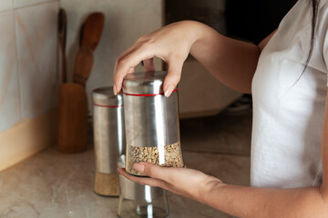 woman hand kitchen utensils