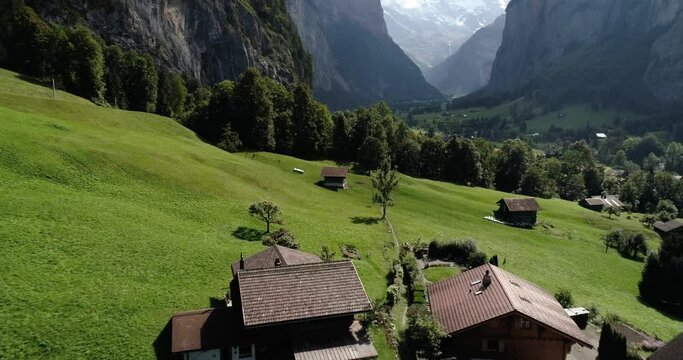 aerial video of a switzerland mountain village in the alps