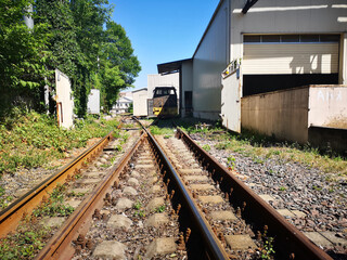 Fototapeta na wymiar two railway lines near the industrial zone