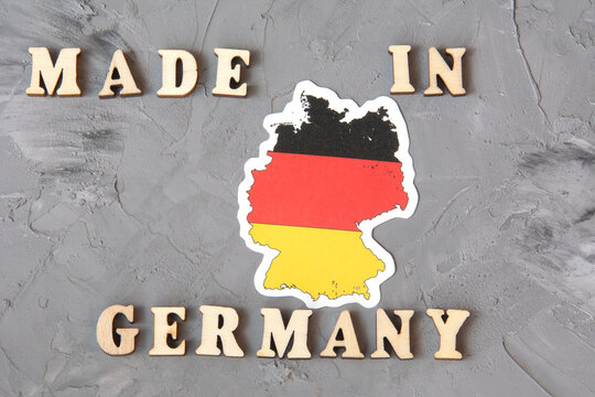 Inscription Made in Germany with map of the country in national colors.