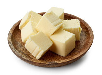 butter pieces on wooden plate