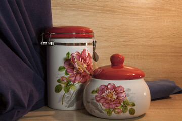 
Set of kitchen ceramic utensils close-up on a wooden background