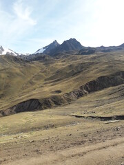 Fototapeta na wymiar Rainbow Mountain Peru and surrounding landscape 2019