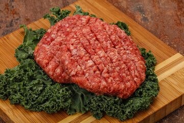 Raw beef burger cutlet for cooking