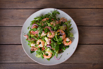 Shrimp bacon and green peas salad. Healthy food. View from above, top studio shot