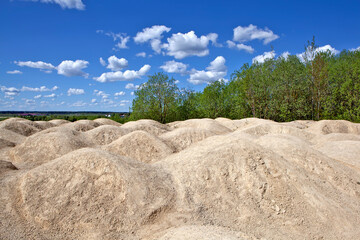 The hill-like stone ridge of the Bornitsky quarry. The village of New Khinkolovo, Gatchinsky district, Leningrad region. Russia