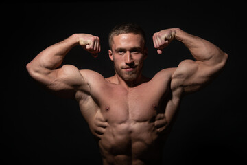 Fototapeta na wymiar Portrait of bodybuilder