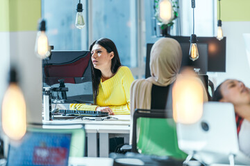 Successful team. Group of young business people working and communicating together in creative office