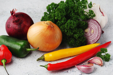 Different spices: onion. garlic, parsley and pepper