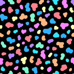 Abstract confetti style colorful dots seamless pattern. Neon hand-drawn spots on black background. Rainbow colored repeating backdrop. Vector print.